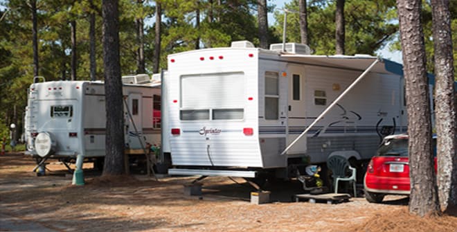 Recreational camping vehicles parked in campground in Byron Georgia